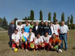 головна